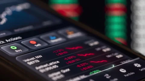 Smartphone screen financial app mixed market movement, rising and falling charts Stock Footage 328088477