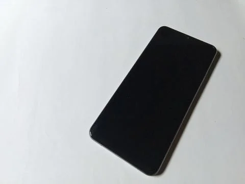Smartphone screen off, isolated white background. Foto stock