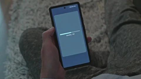 Smartphone Screen Mockup Showing File Uploading Process from Percentage Progress Stock Footage 341569069