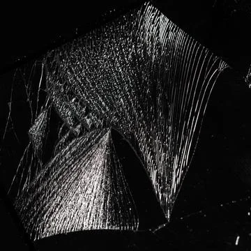 Smartphone screen shattered into fine, webbed fracture patterns Stock Photos