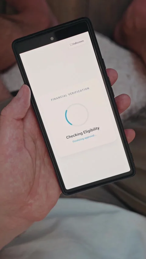 Smartphone screen showing loan approval message with credit rating and claim Stock Footage 341861175