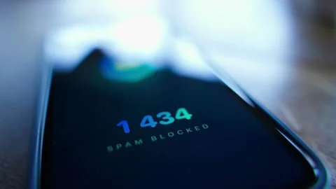 Smartphone screen showing the number of blocked spam calls close-up. Spam 動画素材 342939833