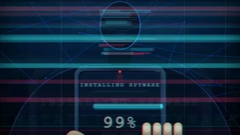Smartphone Screen Showing Spyware Installation Progress with Surveillance Eye Stock Footage 341457173
