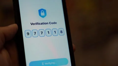 Smartphone screen showing verification code entry and successful confirmation Stock-Footage 341746450