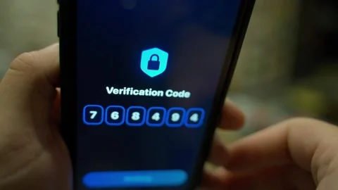 Smartphone screen showing verification code entry and successful confirmation Stock Footage 341746471