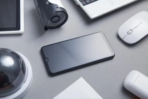 Smartphone, security camera, computer mouse, tablet. Security Stock Photos