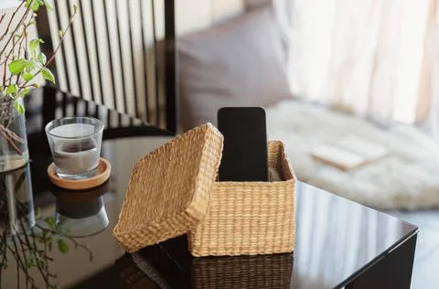Smartphone is in separate box on table Stock Photos