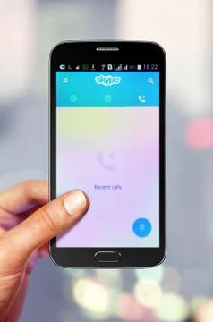 Smartphone with Skype on screen Stock Photos