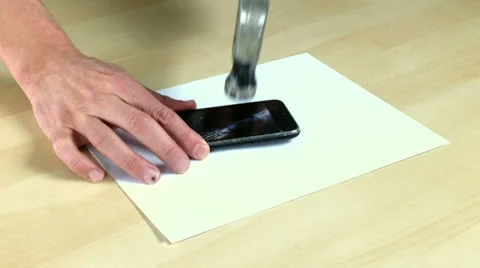Smartphone smashed with hammer Part 1 Stock Footage 34642468