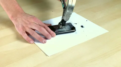 Smartphone smashed with hammer Part 2 Stock Footage 34643018