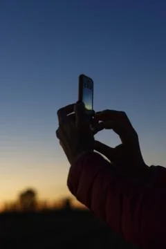 Smartphone at the sunset Foto stock