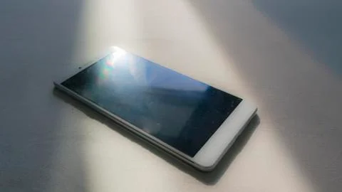 The smartphone in sunshine Stock Photos