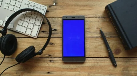 Smartphone on table Stock Footage 63432643