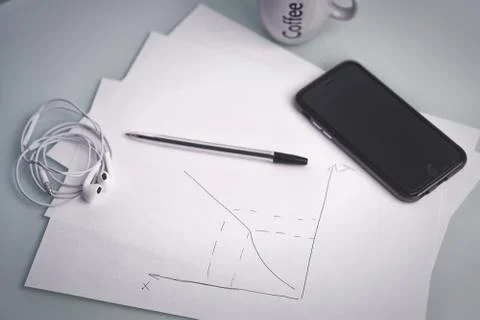 The smartphone is on the table Stock Photos