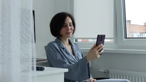 Smartphone talk by video call Stock Footage 196232501