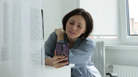 Smartphone talk by video call Stock Footage 196232611