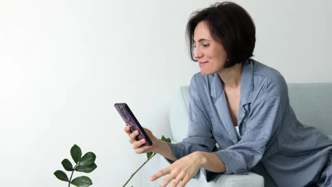 Smartphone talk by video call Stock Footage 196233035
