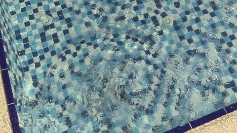 Smartphone is thrown into the pool water. Slow Motion. Stock Footage 79193932