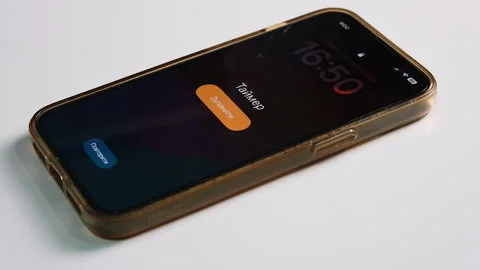 Smartphone timer reaches zero and alarm activates on the screen 스톡 동영상 337420079