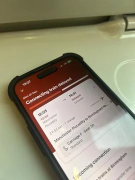 Smartphone With Train Delay Notification On Rail App Foto stock