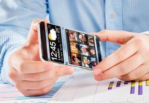 Smartphone with transparent screen in human hands. Illustrazione stock