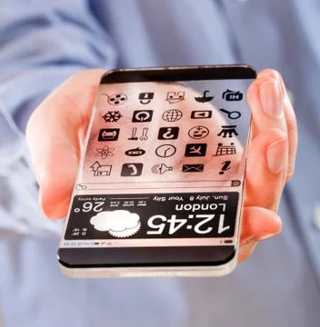 Smartphone with transparent screen in human hands. Foto stock