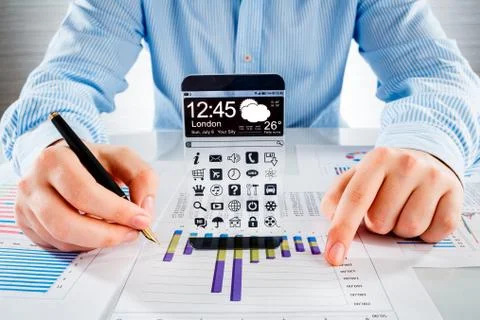 Smartphone with transparent screen in human hands. 写真素材