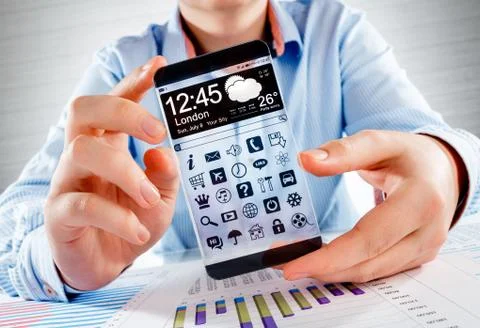Smartphone with transparent screen in human hands. Foto stock