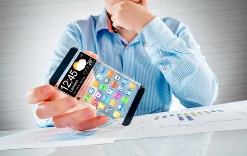 Smartphone with transparent screen in human hands. Foto stock