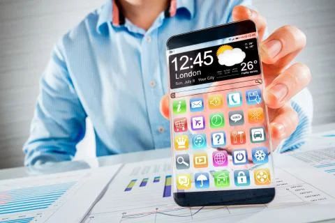 Smartphone with transparent screen in human hands. Foto stock