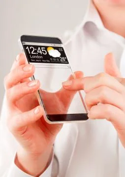 Smartphone with transparent screen in human hands. 写真素材