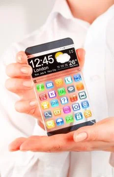 Smartphone with transparent screen in human hands. Foto stock