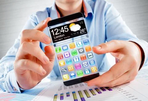 Smartphone with transparent screen in human hands. Foto stock