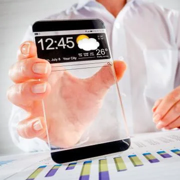 Smartphone with transparent screen in human hands. Foto stock
