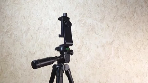 Smartphone tripod. Device for attaching a smartphone to a tripod,static. Stock Footage 280797481