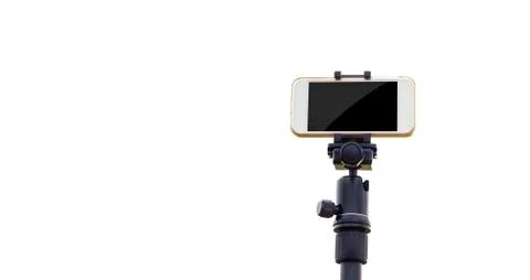 Smartphone on tripod isolate white background 库存照片