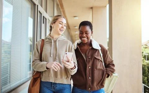 Smartphone, university and students walking with education, college or study Stock Photos