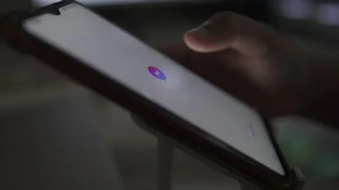 Smartphone using a person night time Stock Footage 290948359