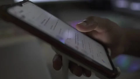 Smartphone using a person on phone stand Stock Footage 290948904