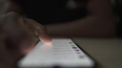 Smartphone using a persong checking social media message Stock Footage 290948967