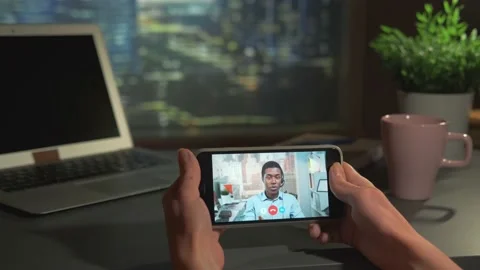 Smartphone with video calling to the manager from office Stock Footage 157596191