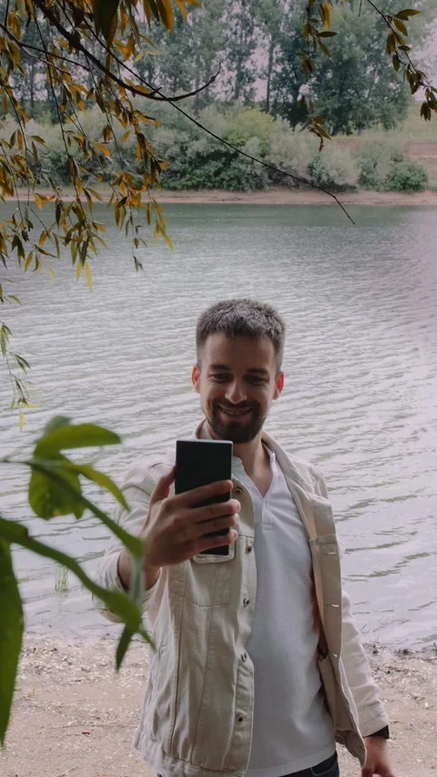 Smartphone Videochat At The River Stock Footage 291716432