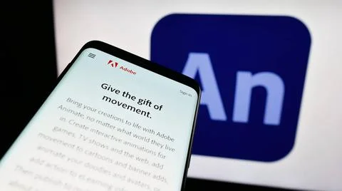  Smartphone with webpage of computer animation software Adobe Animate on s... Stock Photos