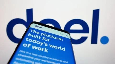 Smartphone with website of US payroll solution company Deel Inc. on screen... Stock Photos