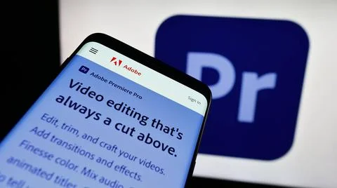  Smartphone with website of video editing software Adobe Premiere Pro on s... Stock Photos