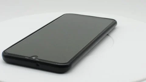 Smartphone on white background with selective focus Stock Footage 141263659