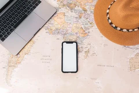 Smartphone with white screen for copy space in world map desk Stock Photos