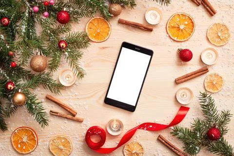 Smartphone with white screen on the table, space for text, top view Stock Photos