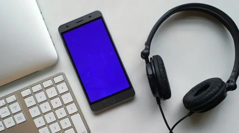 Smartphone white table Stock Footage 63432372