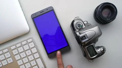 Smartphone white table Stock Footage 63432465
